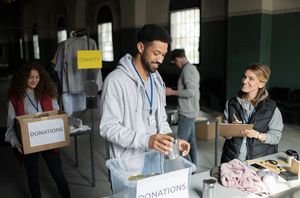 Man filling boxes at fundraiser