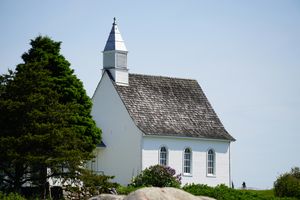 Old Church next to a Tree