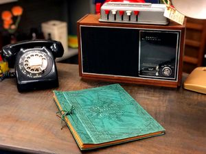 Vintage desk with phone and radio