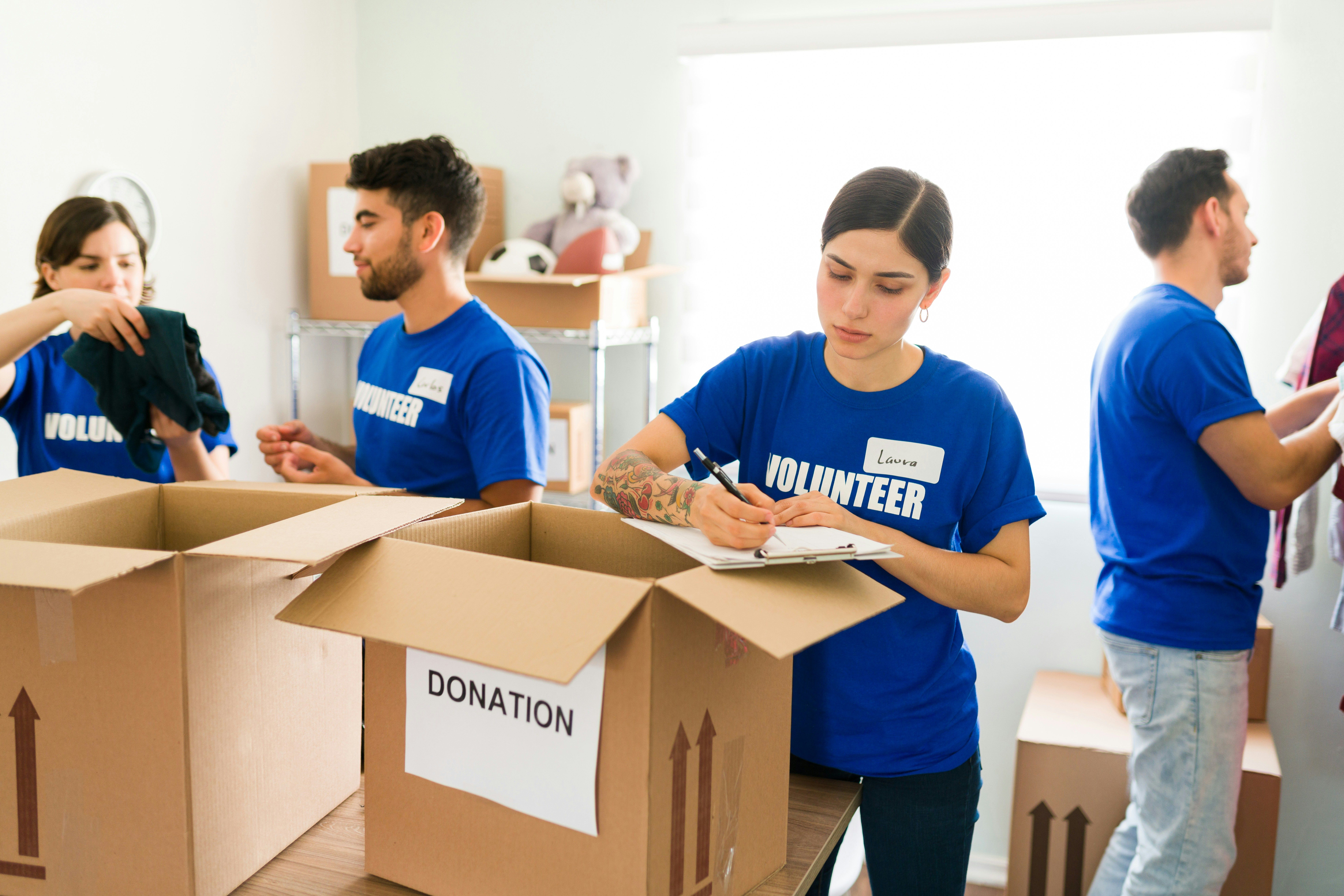 Volunteers stuffing boxes